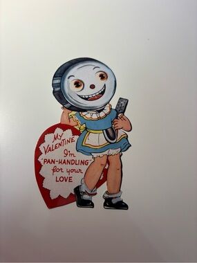 Retro style Valentine Card Cutout Featuring Blue Dress Character with Red Heart